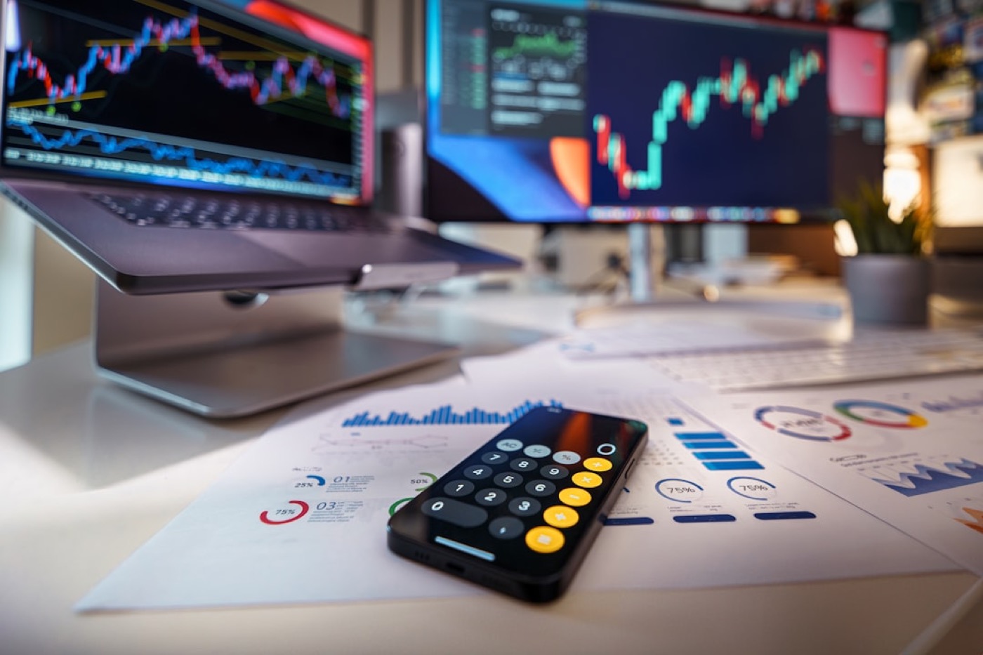 A multi-monitor trading desk showing live market screens