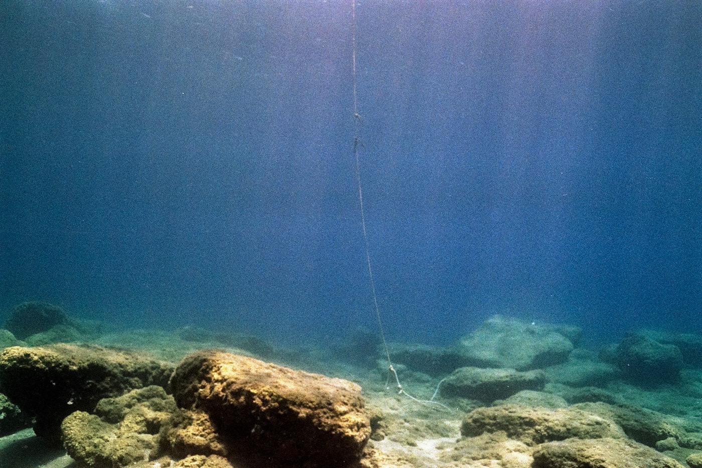 A net submerged underwater, a metaphor for liquidity pools waiting to be collected