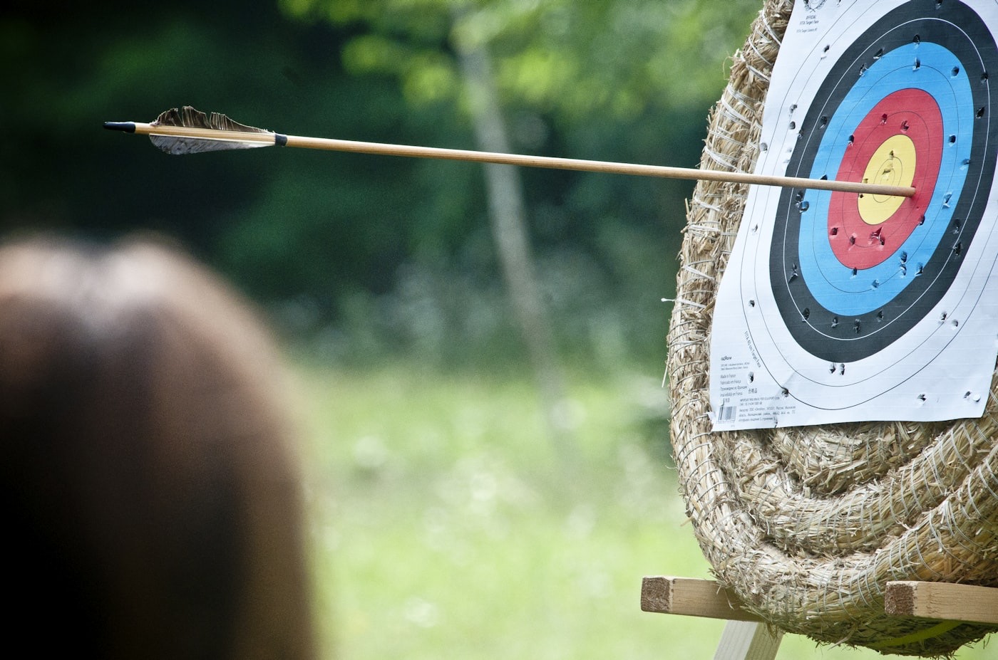A drawn bow under tension, a metaphor for price stretched far from fair value before it snaps back